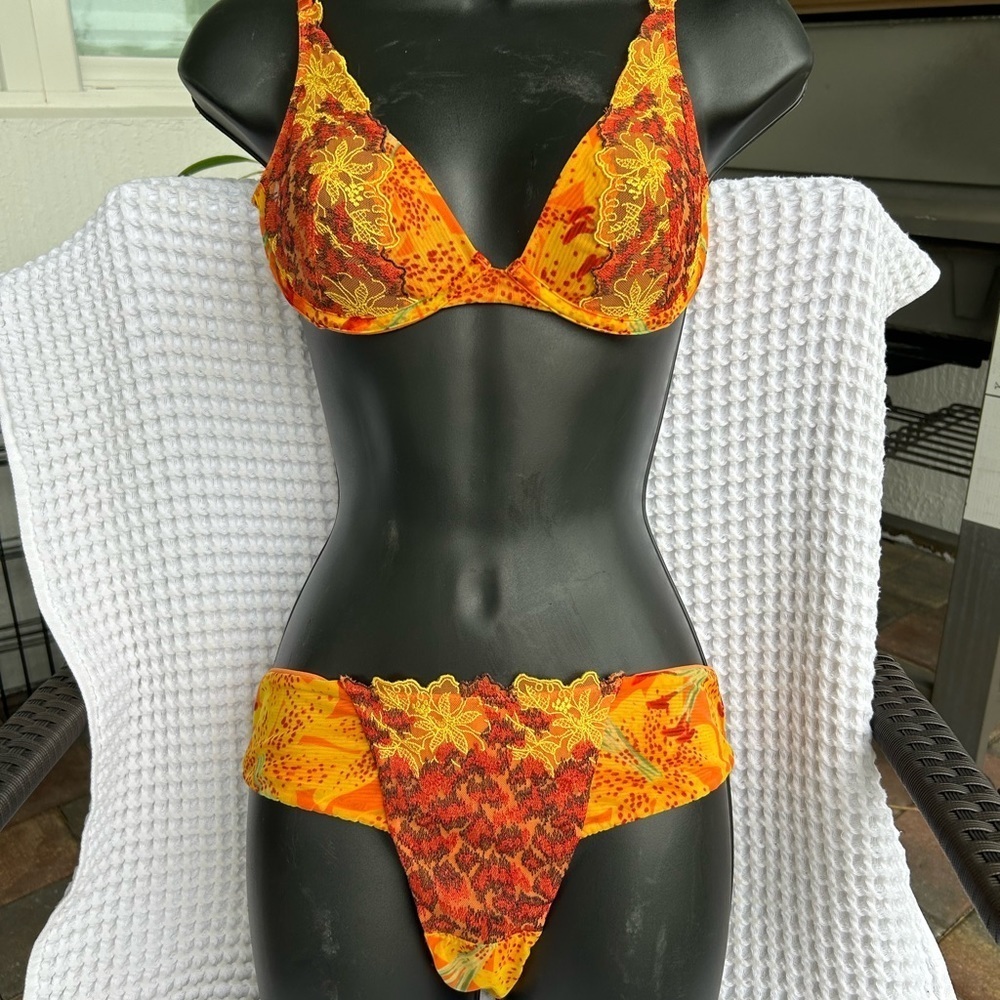 NWOT 2007 Victorias Secret Floral lace and cheetah print bra and g string set.
